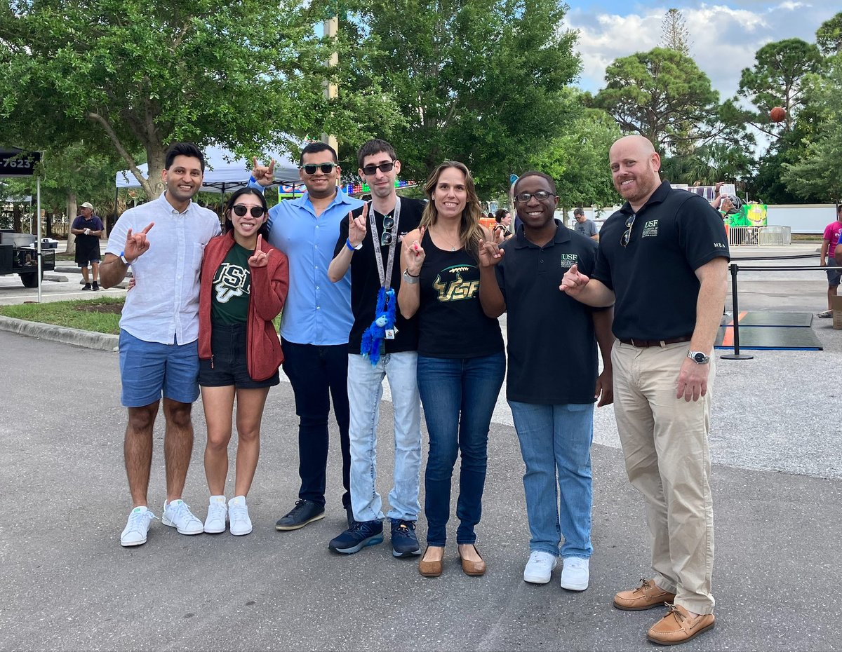 USFalumniAssn's tweet photo. #USFalumni groups have all the fun! Members of the USF Sarasota-Manatee Alumni Chapter had a ball (literally) at the first #USFWeek carnival in 2 years. Thank you to the @USFSM grads and friends supporting #USF. Find your #USFalumni group: https://t.co/Uom1Qxvdgw https://t.co/9itf6JZUua