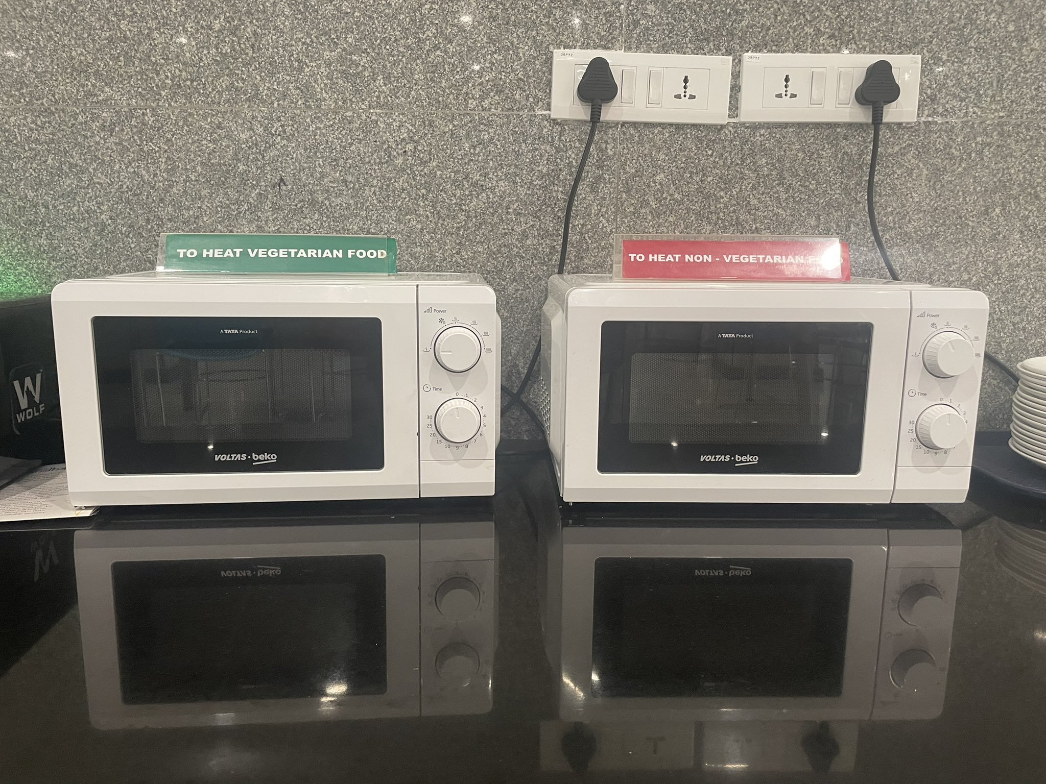 Eating animals 3 Two identical microwaves, one labelled "To heat vegetarian food" and the other "To heat non-vegetarian food"