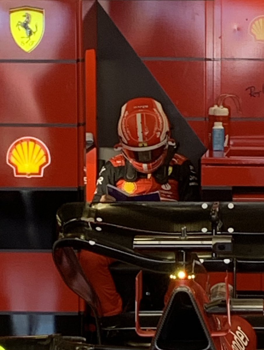 vromvrommadie's tweet photo. Him reading his notes before the race with his helmet on, has the same vibe as me trying to learn everything for a test 5 min before it starts https://t.co/XA5dkYfJWB
