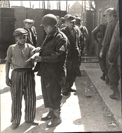 Buchenwald was liberated #OTD 11 April 1945 Learn more: ow.ly/Lpoa50yTDLg American soldiers and young survivors