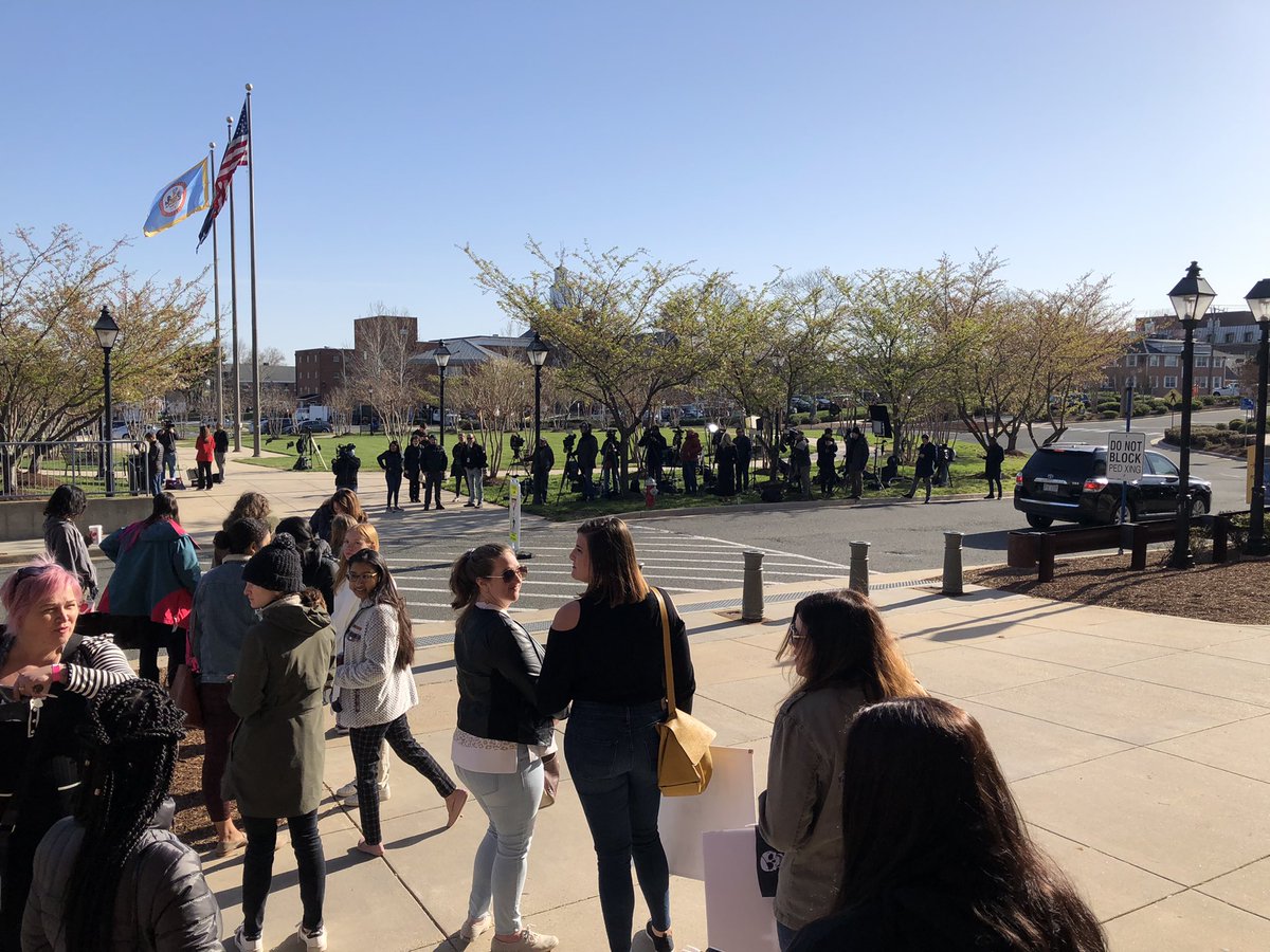 kingWTOP's tweet photo. Interested parties in the #DeppDefamation case gather outside the courthouse doors. Media is restricted to across the street. After today’s jury selection the case is expected to begin Tuesday with live coverage on @courtTV. @WTOP https://t.co/hZxLY1NJ9W