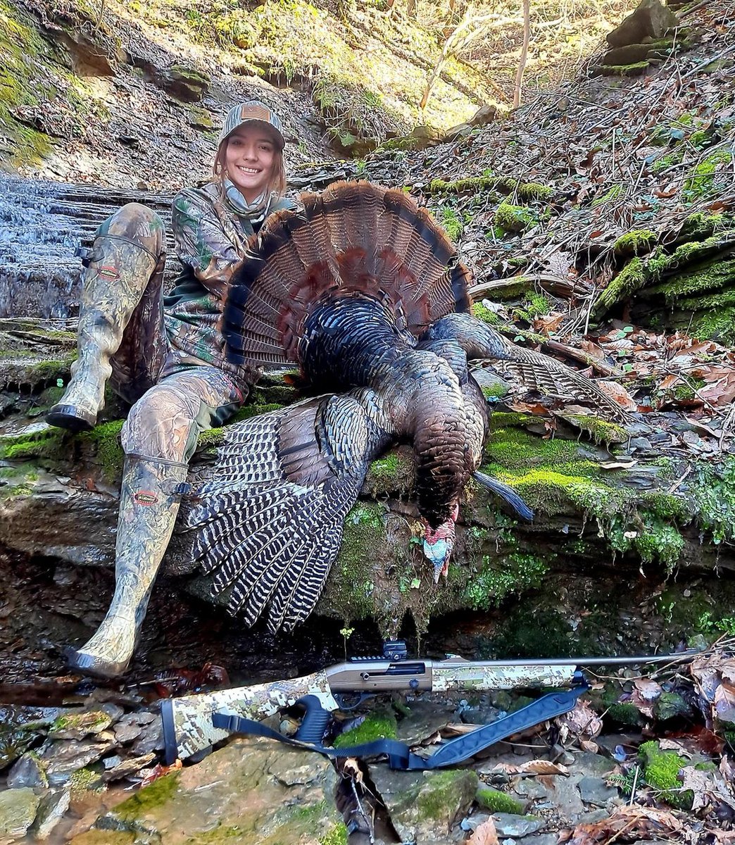 Easton with an awesome gobbler taken with the Burris FastFire 4! PC: Darren Dye