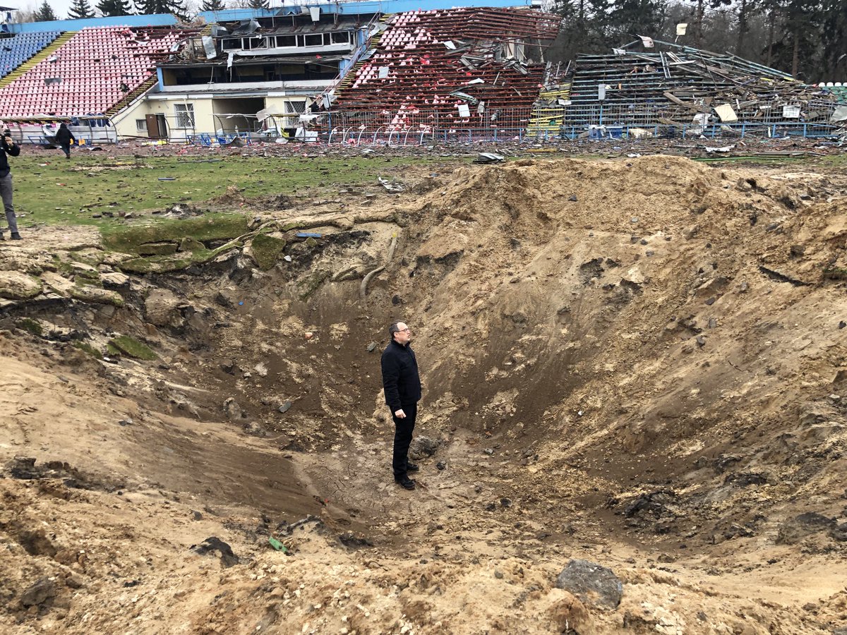 timjudah1's tweet photo. Crater from a Russian missile at the Yuri Gagarin stadium in Chernihiv. Amongst the biggest I have seen. #Ukraine https://t.co/Sh2JmqtpOw