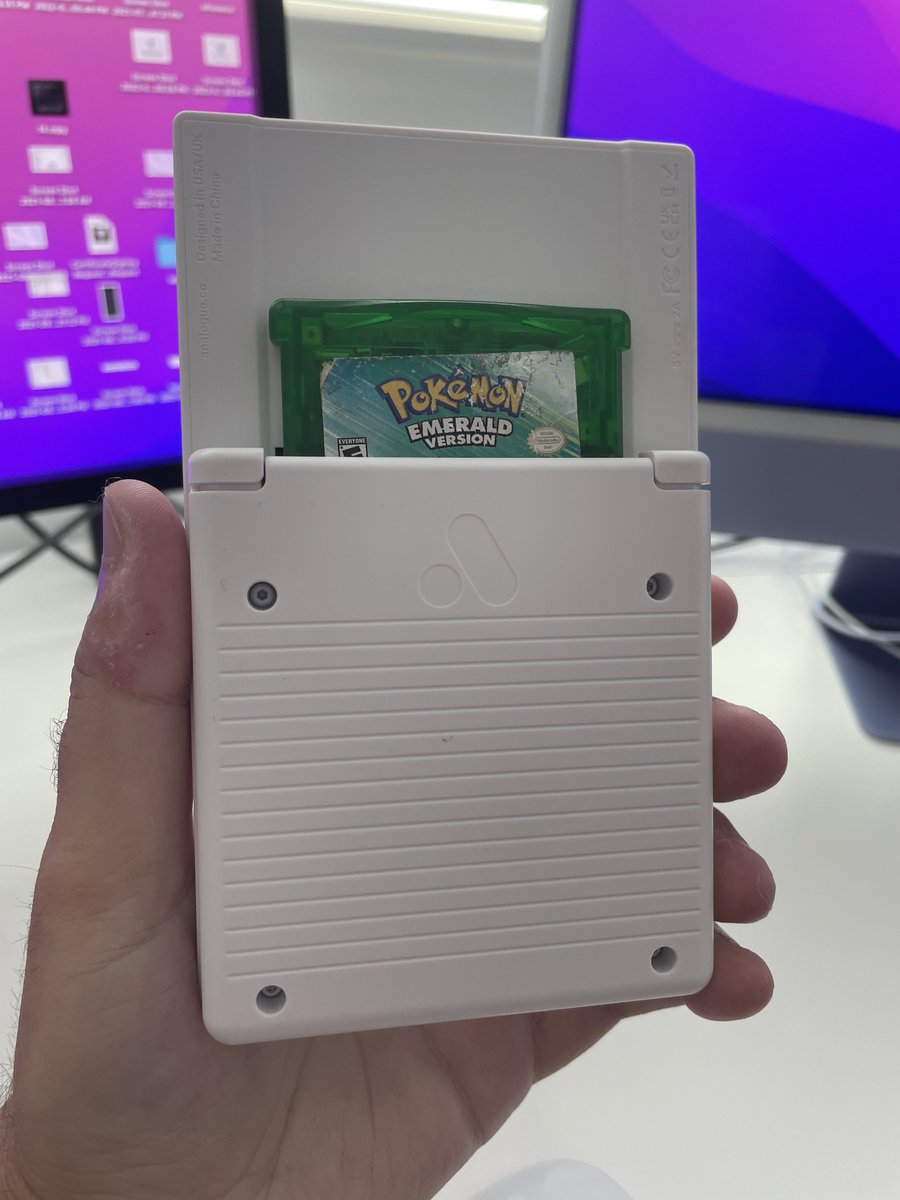 Back of Analogue Pocket with Pokemon Emerald cartridge inserted.