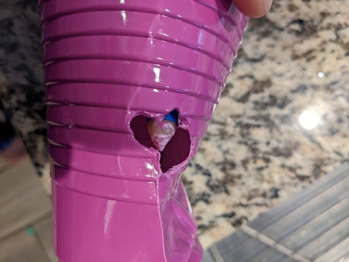 buzz_money's tweet photo. @Crayola #ColorWonder #MessFree Can you explain how this mess free marker melted a hole in this pink solo cup? Found sitting on its side below the shelf where my kids keep their art stuff. Has been sitting there for at most 24 hours. The plastic was gooey... https://t.co/P3LRErLXDk