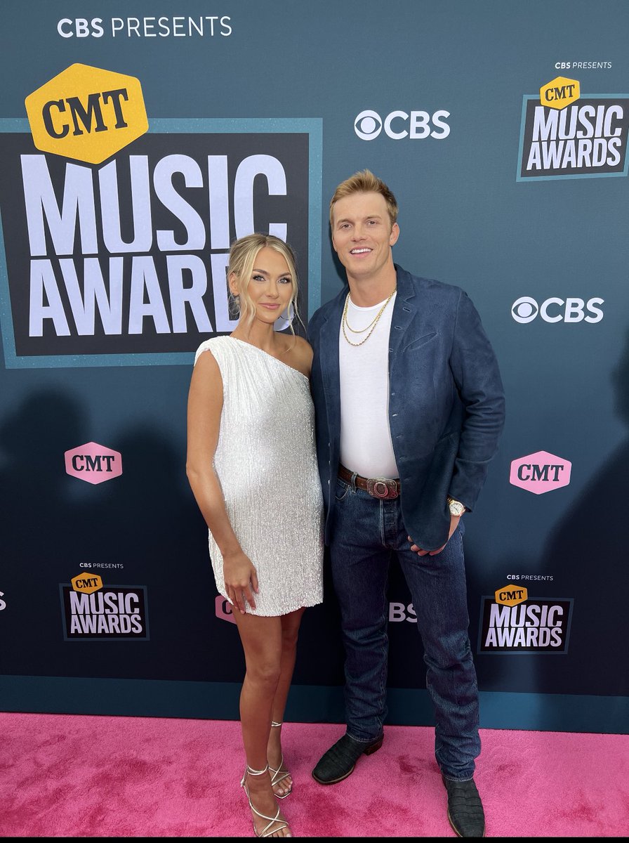 ParkerMcCollum's tweet photo. The McCollums on the pink carpet! About to perform live on the CMT Awards on CBS! https://t.co/MfUhfs8KA4