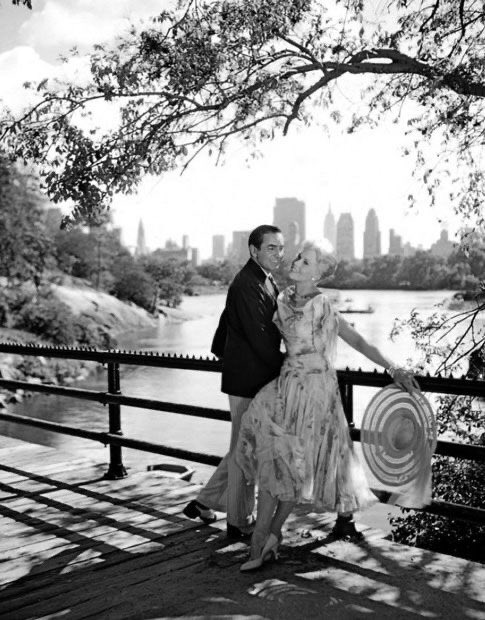 Ty and Kim Novak take a romantic stroll in Central Park in THE EDDY DUCHIN STORY (1956)