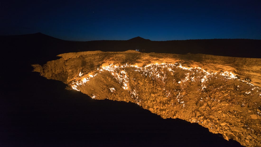 The Darvaza gas crater also known as the Door to Hell or Gates of Hell, is a burning natural gas field collapsed into a cavern near Darvaza, Turkmenistan.
Soviet geologists intentionally set it on fire in 1971 to prevent the spread of methane gas.