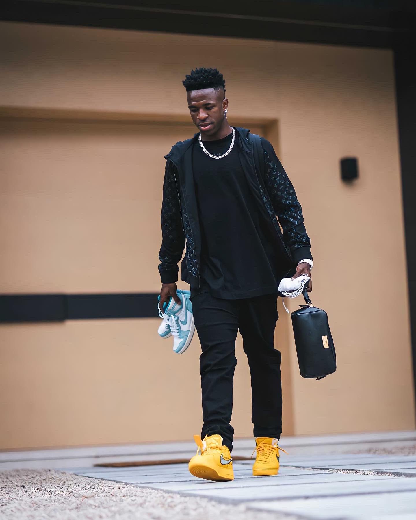 Footballer Fits on X: Vini Jr. rocking Louis Vuitton before