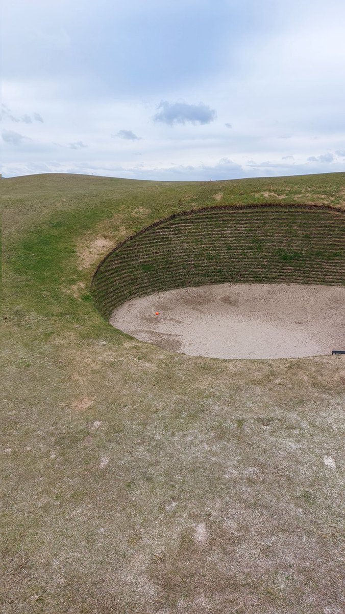 DouglasAird's tweet photo. @CoastalMalc @BurntislandGolf Nice, try this one from the Old Course.  It's in the bunker but not keen to come out. https://t.co/tNfPdAy2dg
