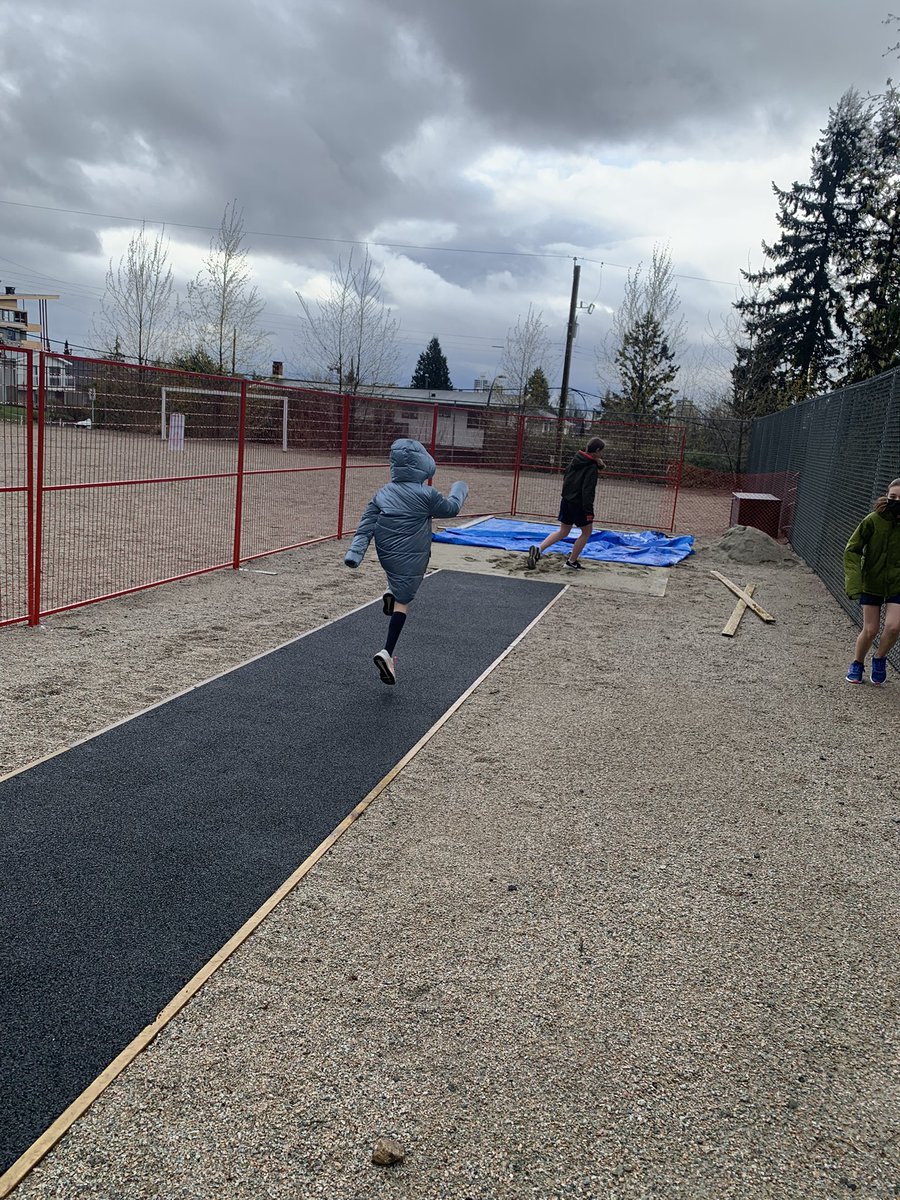 Who would’ve thought that our first day using our new long jump pit we would need coats and wait for the snow to stop on April 12.
