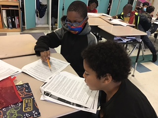 These fourth grade scholars are practicing their fluency, while working in partnerships! #GrowingMinds #GrowingLeaders #GrowingPartnerships