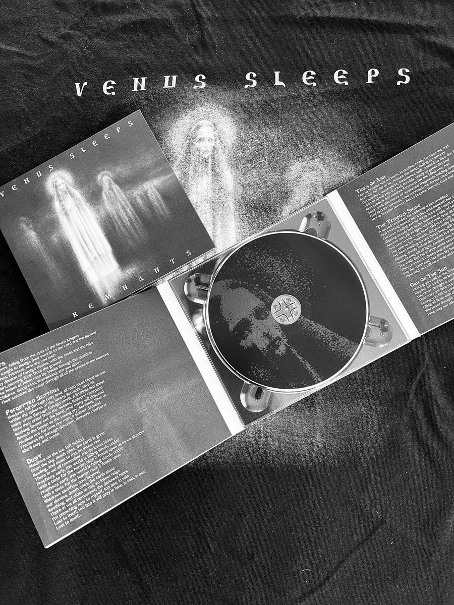 Remnants Cd &amp; T-Shirt Bundle!

Remnants T-Shirt design. 2 Color (White/Grey) Print on black <a href="/gildancorp/">Gildan</a> Heavy cotton.

Artwork By Sarah Sheil Art &amp; Remnants - 6 Panel Digi-Pack Cd.

Available from: venussleeps.bandcamp.com

#DOOM #doomMetal #Remnants