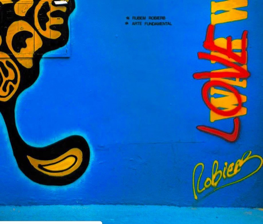 RubemRobierbArt's tweet photo. - I painted this “WAR(LOVE) WILL NEVER END” mural in 2016 For @ArteFundamental in Miami. The words got a deeper meaning now by the horrible reality in Ukraine. Even in War, Love Will Never End! choosing the Ukrainian flag colors in 2016 gives me goosebumps. #standwithukraine 🇺🇦 https://t.co/YJ5T4fjbWQ