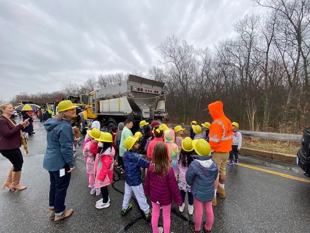 AndoverPS's tweet photo. As part of their year-long project on how to build a community, @HPE_Andover 1st graders get a lesson from @AndoverDPW on how best to add roads to connect a town. As a special treat, students went outside, where they were delighted to find DPW trucks and employees waiting! https://t.co/fhwPaU83s3