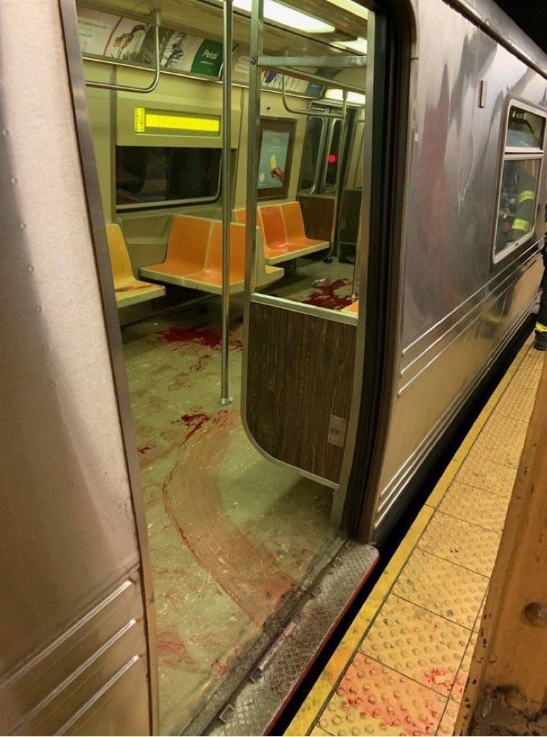 NewsAlertUK_'s tweet photo. New York Subway incident:

- Incident at 4th Ave and 36th street subway  
- 13 people injured, one critically injured
- Reports of smoke device detonated and unexplored devices
- Male suspect wearing gas mask and orange vest fled the scene https://t.co/Cwv4yww9mh