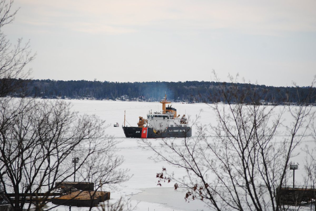 Bayfield_WI's tweet photo. Trivia Tuesday: The U.S. Coast Guard Cutter Hollyhock broke up ice between Bayfield and Madeline Island on Sunday. Besides ice cutting, what other missions does the Hollyhock perform? 
Picture Credit: @apostlerentals.com https://t.co/EEtKvi6Gm1