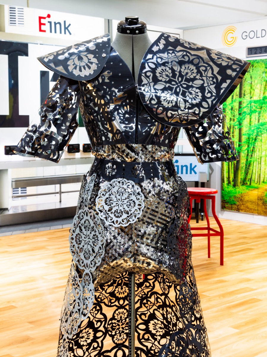EInk's tweet photo. You've seen E Ink in eReaders, eNotes, watches, phones and more, and in 2018, E Ink and @Bergmeyer showcased the display technology on a dress! #25yearsofEInk https://t.co/jXDkQF4O0H