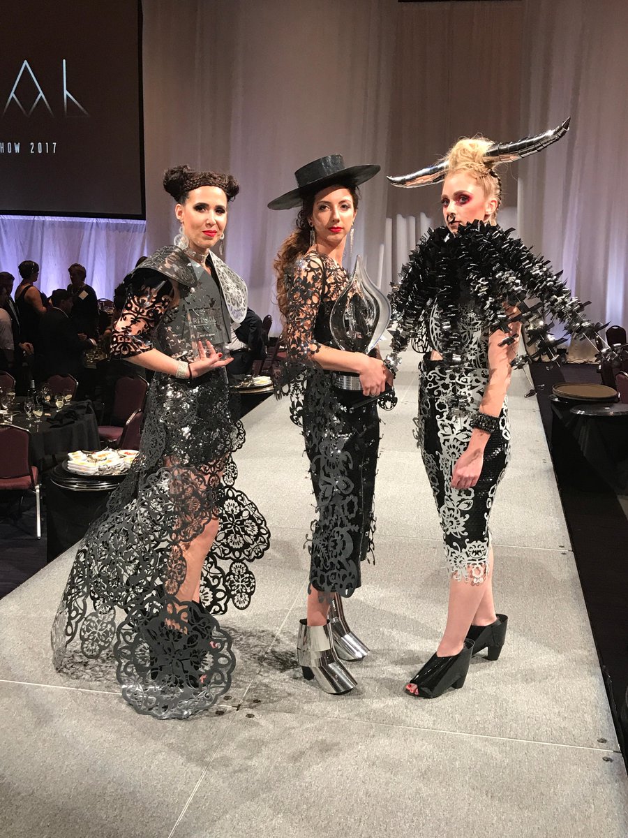 EInk's tweet photo. You've seen E Ink in eReaders, eNotes, watches, phones and more, and in 2018, E Ink and @Bergmeyer showcased the display technology on a dress! #25yearsofEInk https://t.co/jXDkQF4O0H