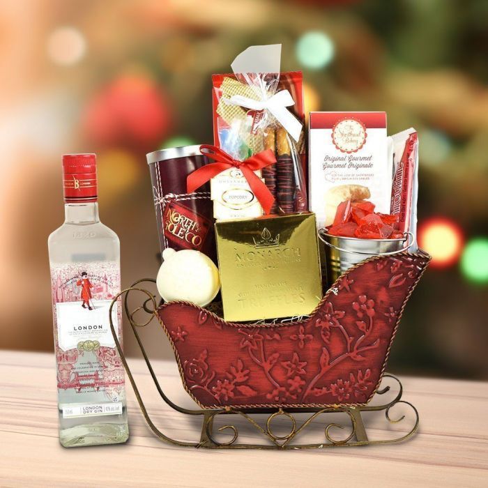 northpolecomp's tweet photo. Santa’s Sleigh Of Treats With Gin comes complete with holiday chocolates, candy, pretzels, popcorn, a bottle of gin and much more to keep the family entertained during the holidays. 

Hurry! Shop now! 🎁

https://t.co/6HIRHTfAtE

#northpolecompany #specialgifts #gifts #giftbox https://t.co/dbCJkPJHOZ