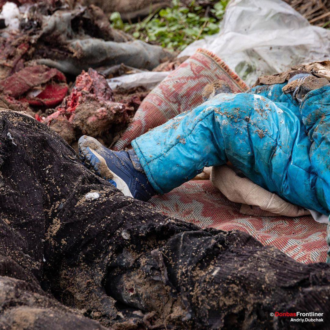 This picture haunts me entire day. New sneakers, blue snowsuit, I assume this 2yo kid was very loved. His mother tried to bring him to safety.All signs they were civilians were there. russians shot their car with a heavy machine gun. Entire family killed. This is too much to bear