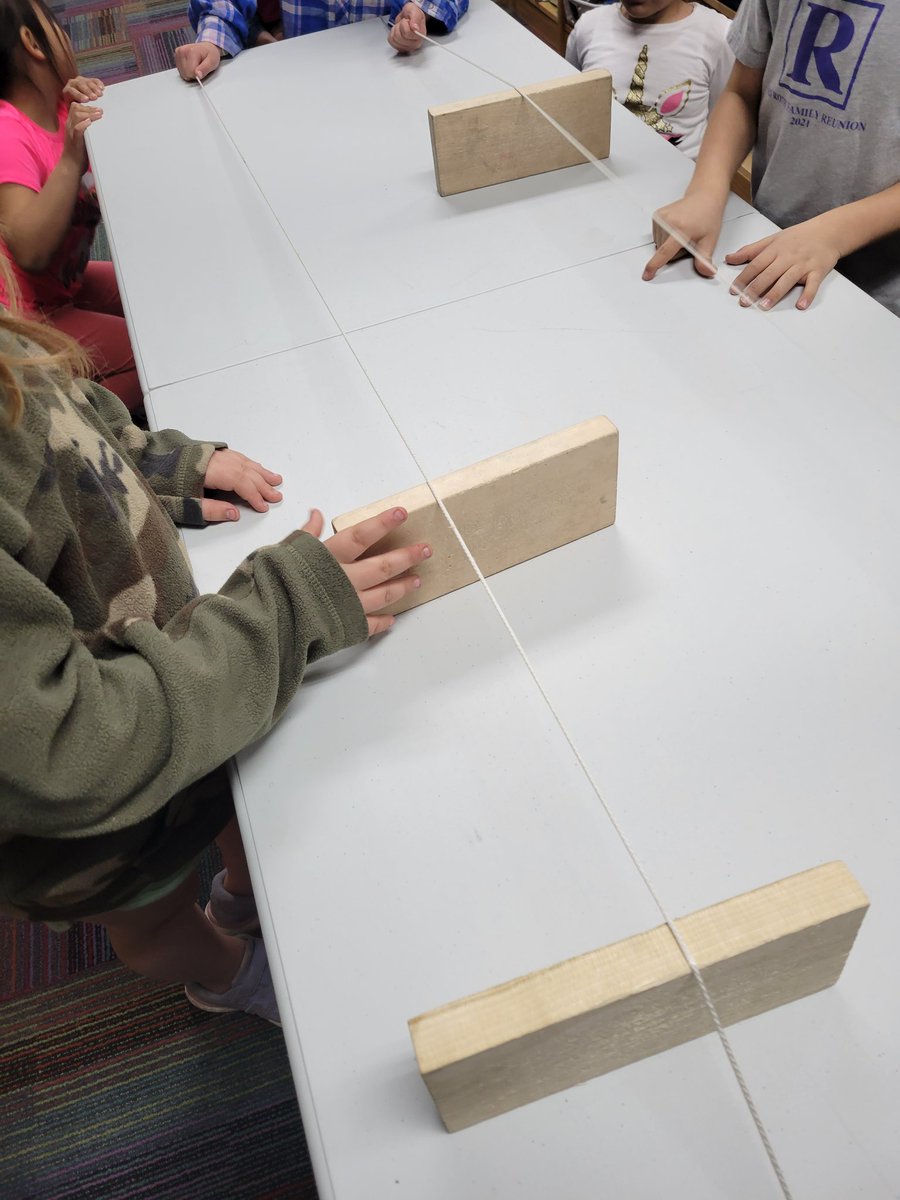 MissGoodwin2G's tweet photo. Learning how to play the table fiddle in science.  We just started a new unit called Sound and Light.  #washpride https://t.co/cd3KIluBRj