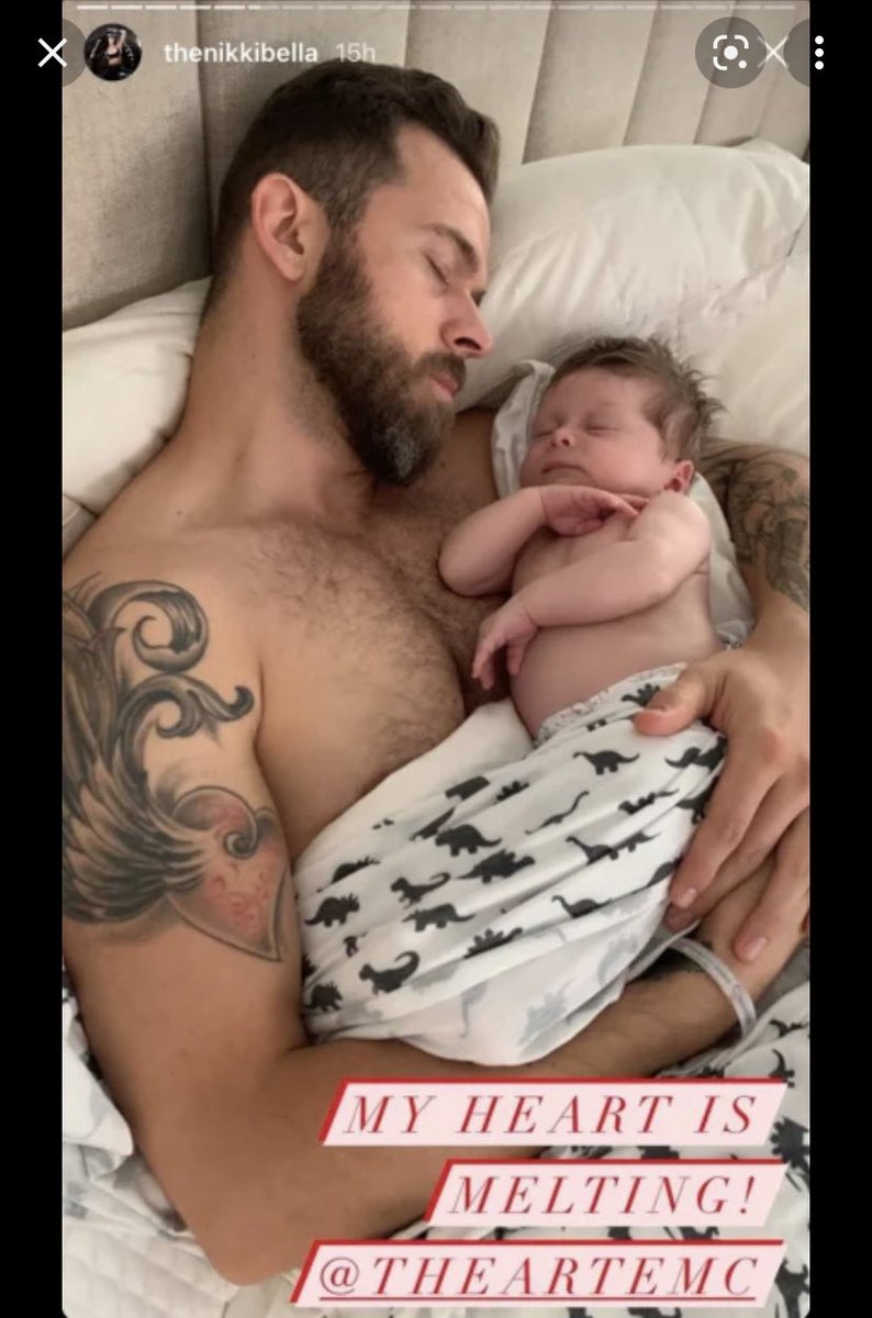 Old picture of Artem Chigvintsev with his baby. I may have a thing for dads with babies. I also heard he and Nikki Bella finally set a wedding date. Yes, former WWE Nikki Bella. I know way more about the WWE than I wish I did. https://t.co/fxQUw7oYXO