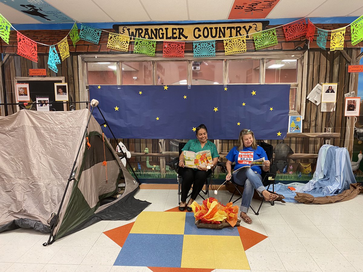 Enjoying a good book by the campfire! Drop Everything and Read Day at Ward!!! Just two girls roasting marshmallows for our s’mores! @WardWranglers @pjohnson1971 @nisdelemelar #campoutwithagoodbook #dropeverythingandread