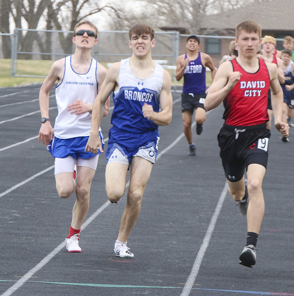 TR: John Fehlhafer of <a href="/cpsbroncos/">Centennial School</a> battles for a place in the 800-meter run at Milford. #broncoblue #noquituntilthefinishline #battle