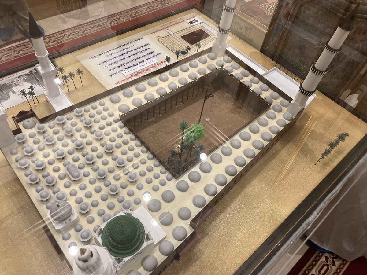 umrah2022's tweet photo. The model in the middle shows us how much the Prophet Muhammad (SAW)’s masjid has expanded over the past 50 years.                          Question: When did the green dome become green? https://t.co/jkKg0hTUih