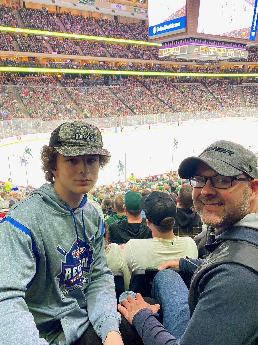 Father &amp; son enjoying the game tonight! Go #mnwild !