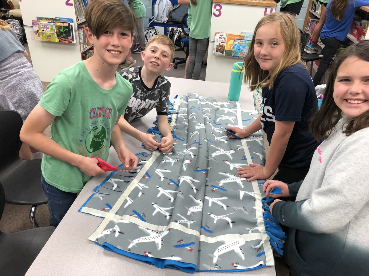 AESClubSTL's tweet photo. We were able to give the sensory boards to some of our special education teachers. We can’t wait to see our friends enjoying them. We also finished blankets for Katie Do Kare Kits. @AESBulls #ifnotuswho #kidshelpingkids https://t.co/1cnfsT5P4h