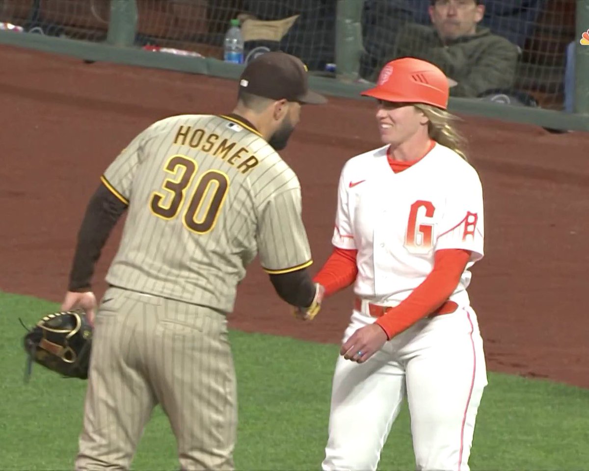FOS's tweet photo. By replacing ejected Giants 1B Coach Antoan Richardson, Alyssa Nakken has just become the first woman to coach on the field in an MLB game. https://t.co/YZpEJaKgPr