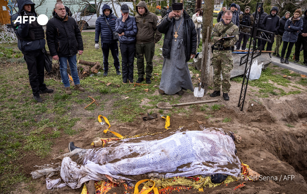 AFP's tweet photo. War in Ukraine: Latest developments

- Biden accuses Russians of genocide
- Ukrainians 'surrounded' in Mariupol
- Over 400 bodies in Bucha
- Rape allegations
- Invasion going 'calmly': Putin

https://t.co/oQcBcffuaf https://t.co/WwGYBSVetQ