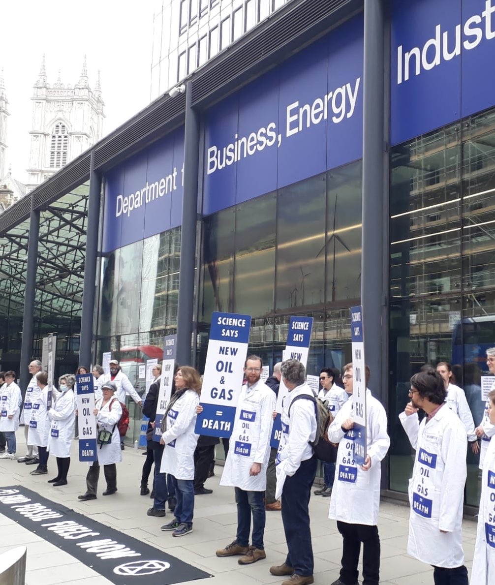 RichNP's tweet photo. Scientists glued on in Westminster #ClimateBreakdown https://t.co/NImg31Az0S