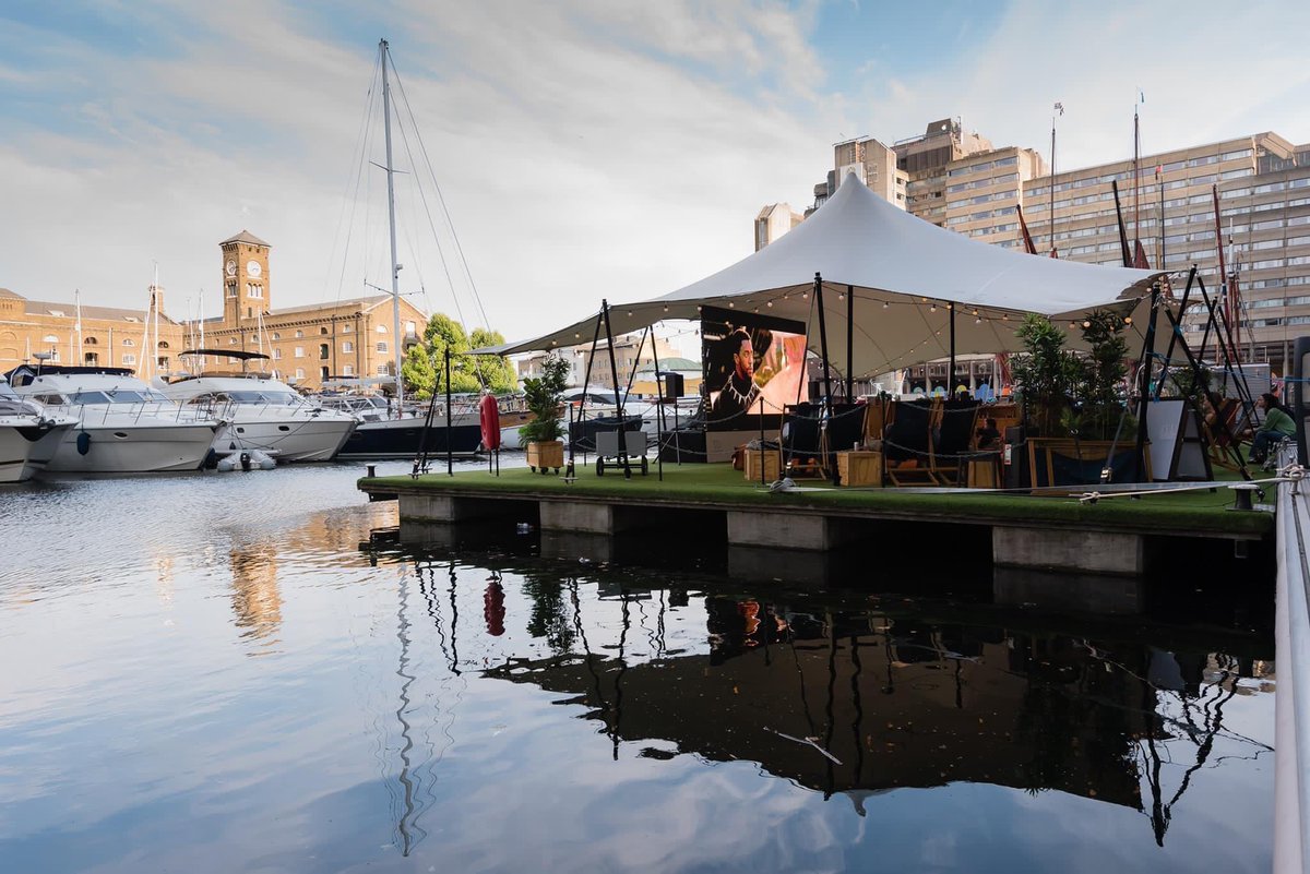 StKatsMarina's tweet photo. The best seat in the house (marina)! St Katharine Docks Marina has its very own events platform which is perfect for boat rallies and get togethers. Here it is installed in preparation for the #EasterWeekend and #LondonLuxuryAfloat #skdocks #deckchairs #eventsplatform https://t.co/K3su0oXwbI