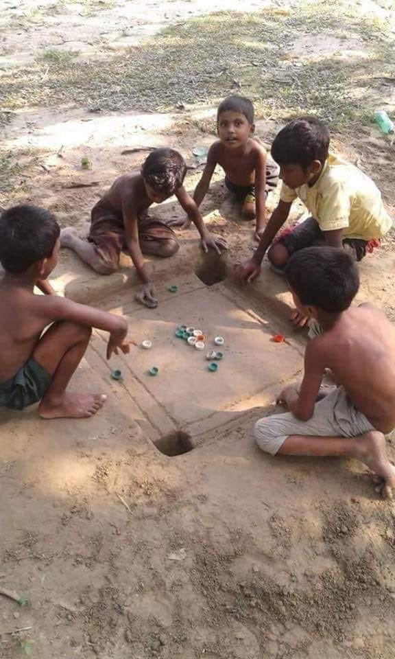 AlmasSheikh97's tweet photo. What an Idea sir Ji!
They just got bottle caps and a tree shade to have there fun. No fashionable clothing and no luxurious carrom board. 🍀🍀✨ https://t.co/DGavEH5dS5