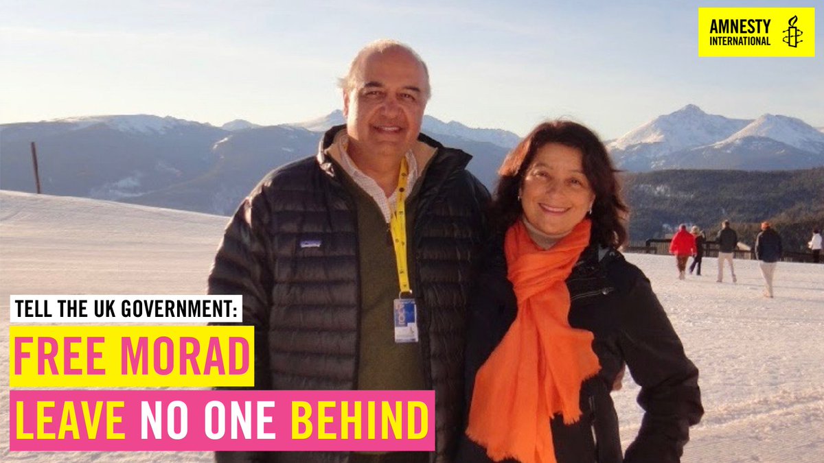 Morad and his wife stand smiling at camera, arms around each other, against a snowy landscape. The text overlay reads: Tell the UK government: Free Morad, Leave no one behind with  Amnesty logo in top left corner
