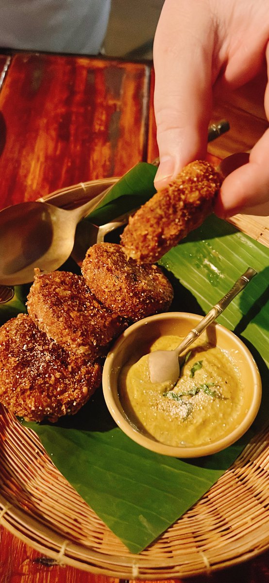 niannelynn's tweet image. Date night with @Bangkok_Simon after 2 years. Can’t get his paws off moo larb tod with pig ears. #MonkeyPod #bkkfatty