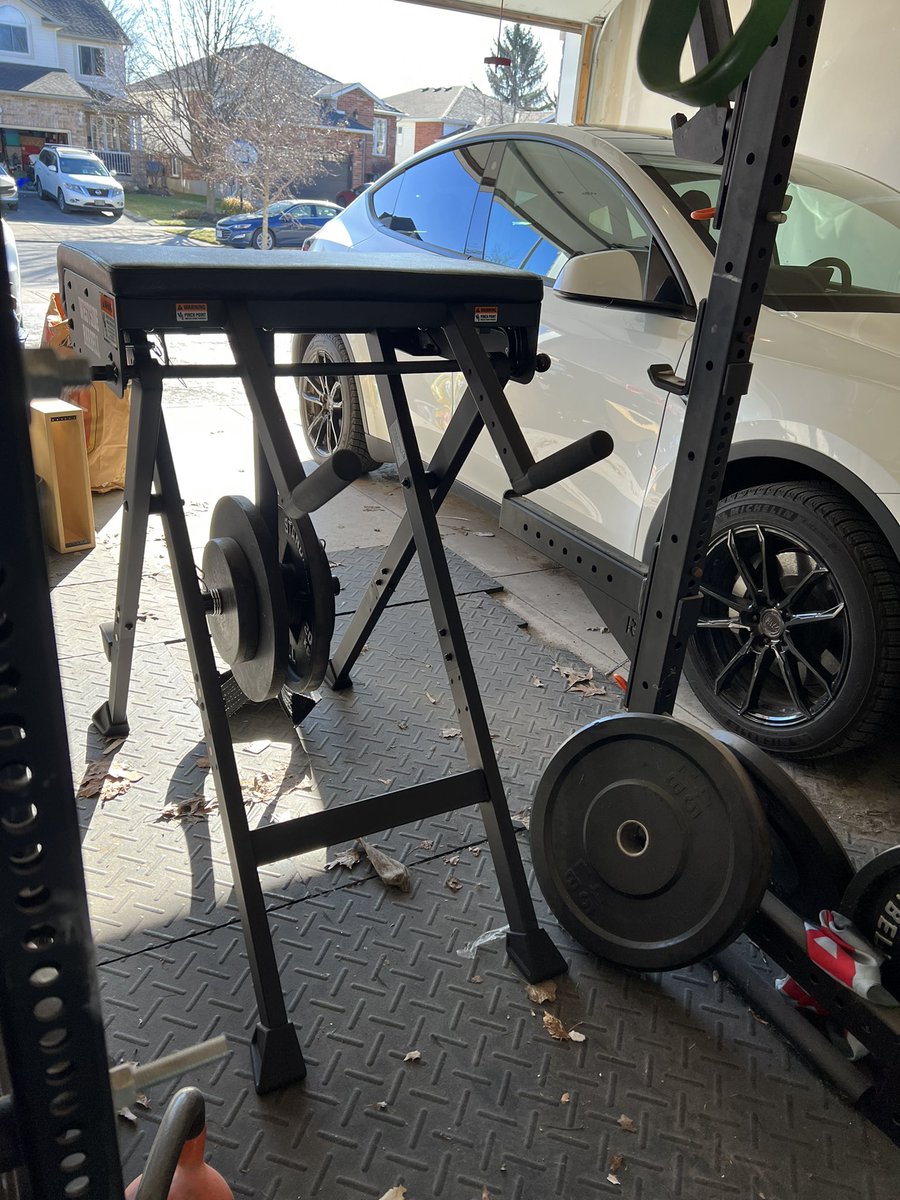 adamwathan's tweet photo. Added a reverse hyper to my garage gym to try and rehab a bad back injury that’s plagued me for about 9 years and forced me to stop competing. Using it every day and surprised by how much of a difference it’s already making 🤯 https://t.co/GTNBkgw1Q0