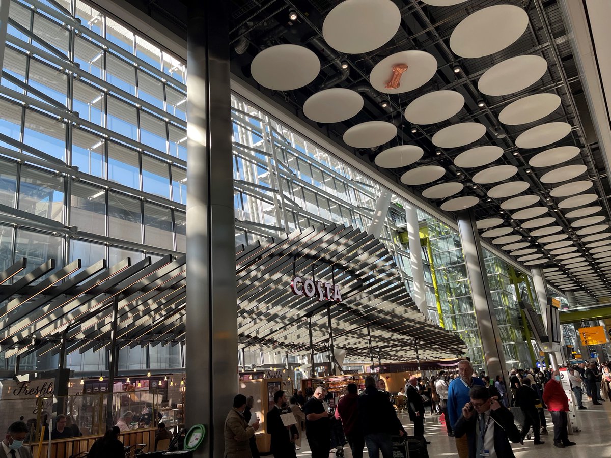 This Easter holiday you may walk past our work for Costa Coffee at Heathrow Terminal 5. Bespoke extruded aluminium fins with integrated LED lights set out in a curved wing shape, over the seating area of the coffee shop. #architecture #buildingdesign #solarshadingsolutions