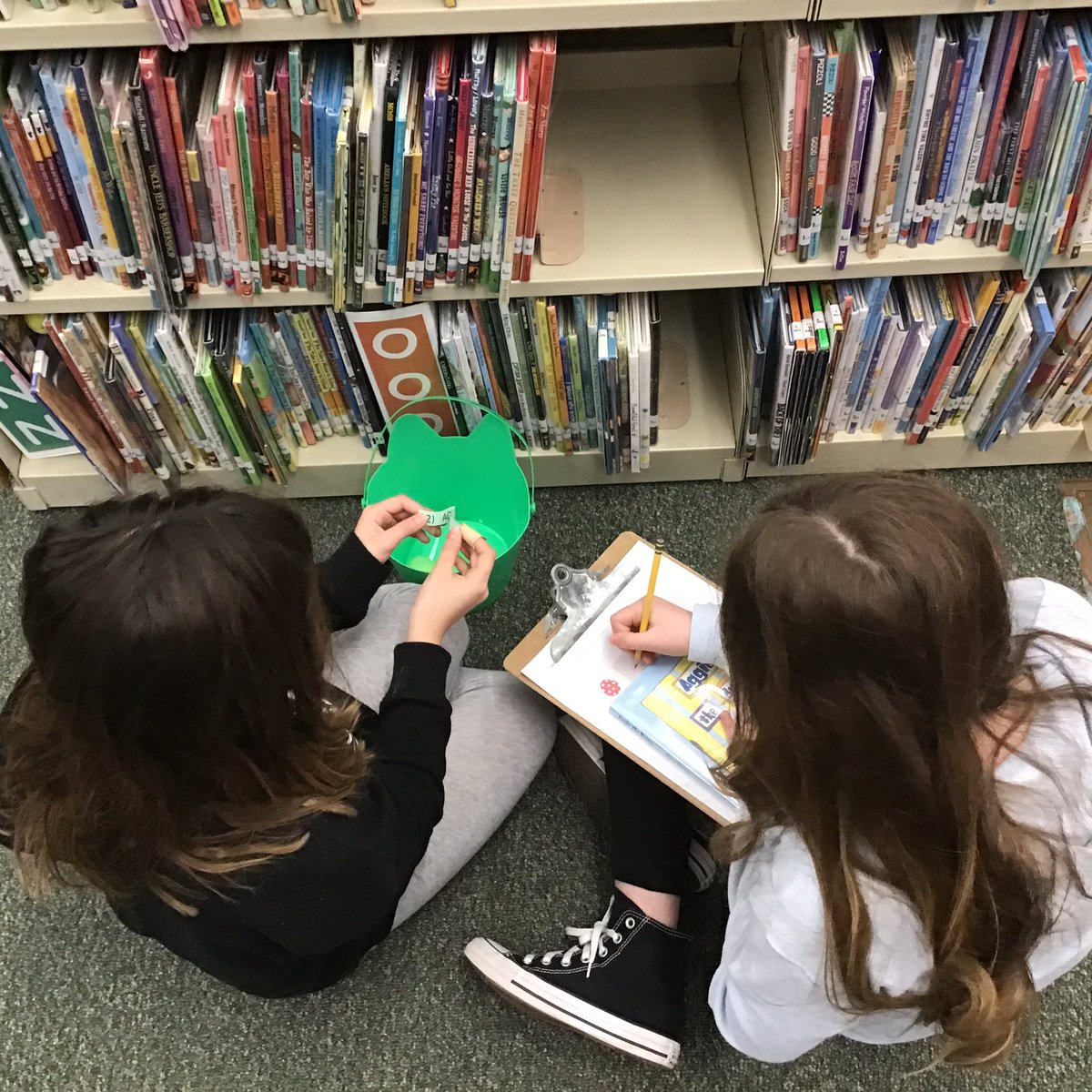 NBSLibrary's tweet photo. Using call numbers to find eggs throughout the library @nbes220 #coltpride #seethestudent220 https://t.co/AfXYcHwpSO