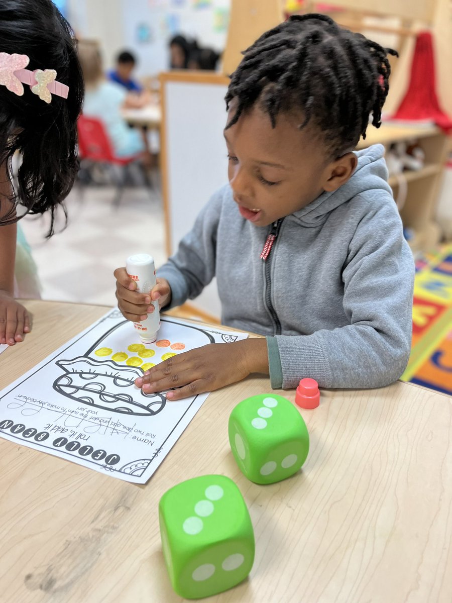BilalsPreKClass's tweet photo. Roll, add, and put those jellybeans in the jar! 🔢🎉 #makingmathfun #thisisprek @APSGardenHills @aps_OEL https://t.co/wdviVm8HqE