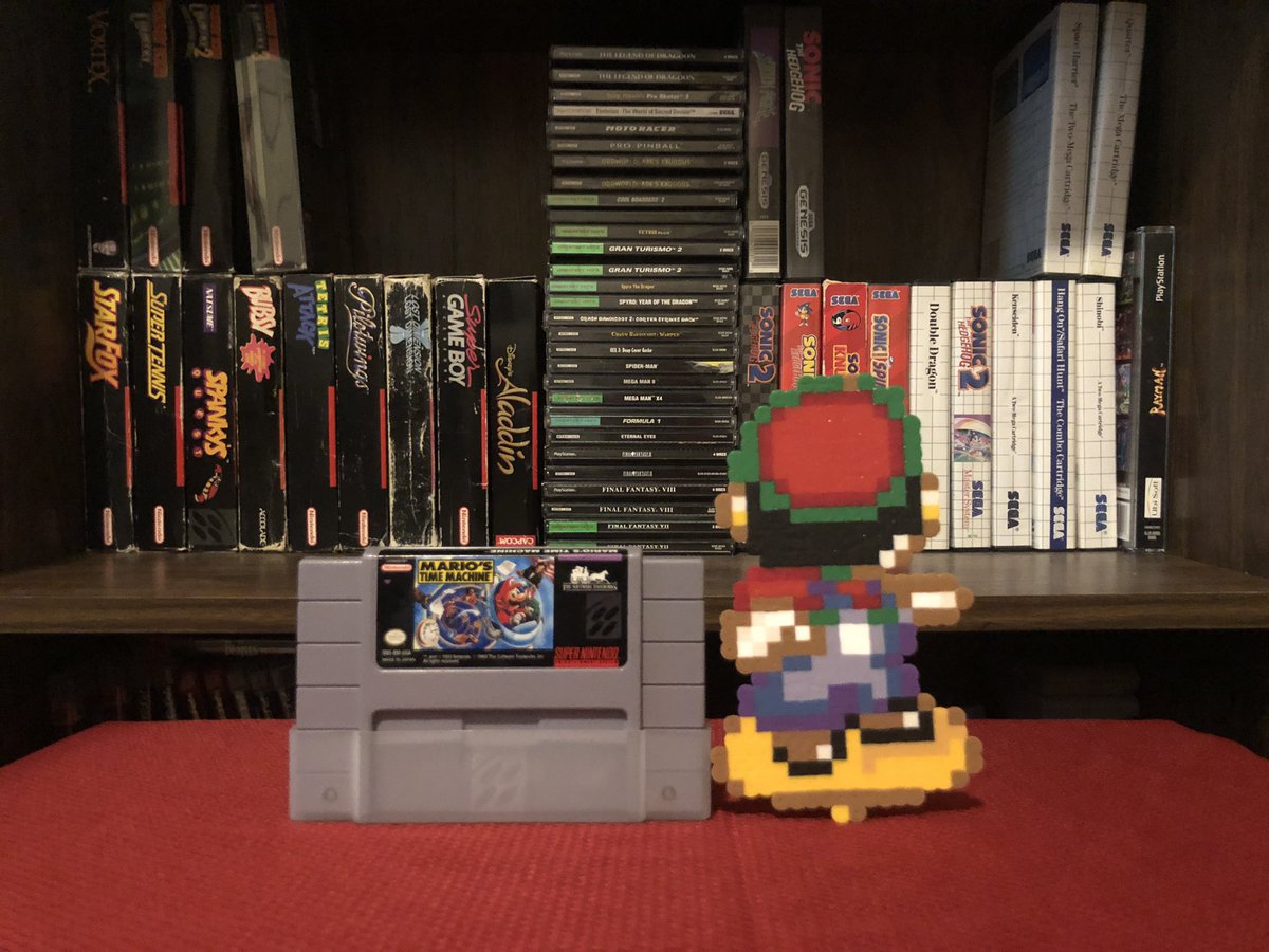 pixelsrebuilt's tweet image. Game #105: Mario’s Time Machine! Another weird one I used to rent often as a kid, I weirdly enjoy this game for the humorous writing, the educational value, and, of course, surfing Mario! #mariostimemachine #nintendo #perler #pixels #snes #mario #SuperMario