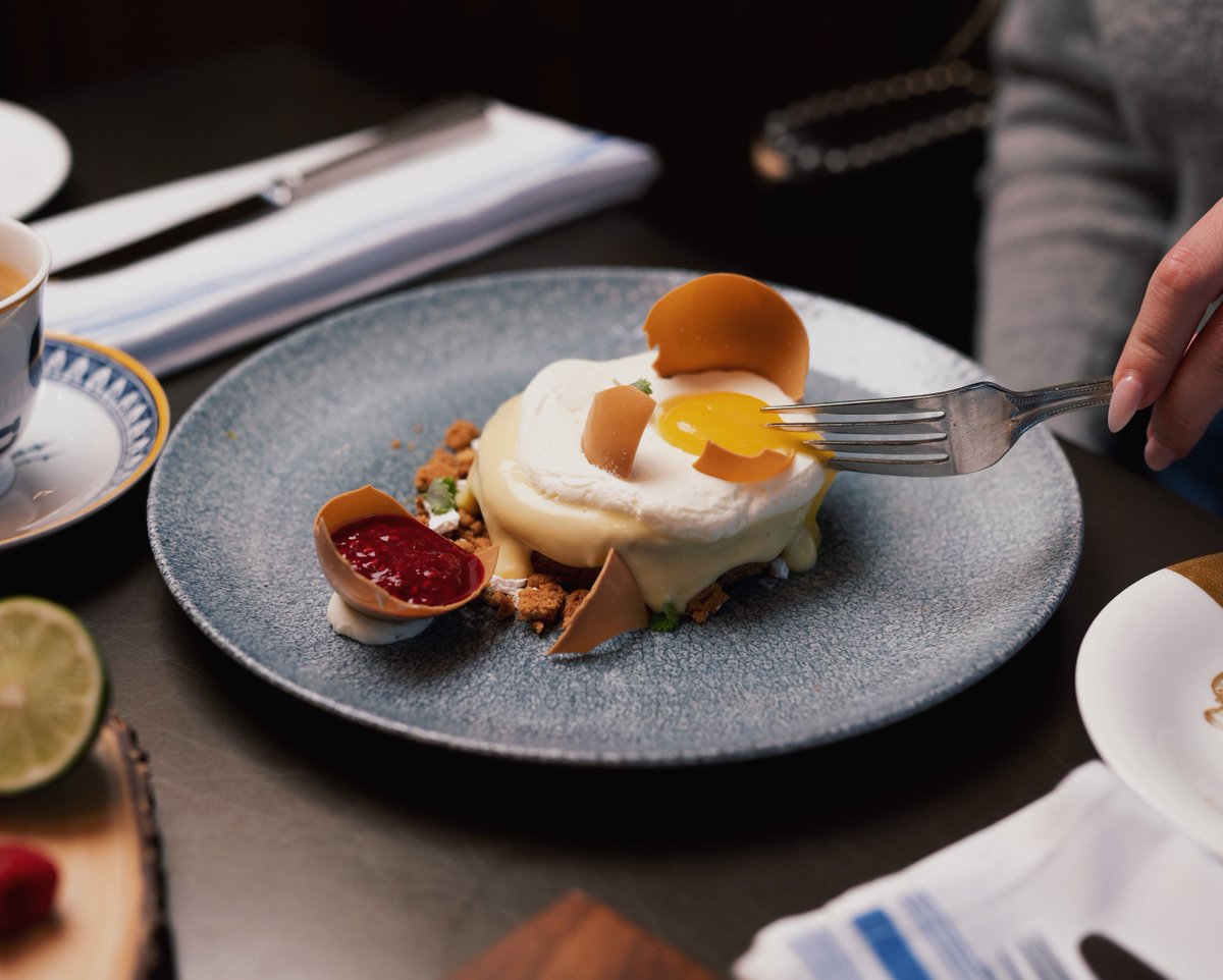Available exclusively on Friday, April 15th, in all its "Is It Cake?" glory, Head Pastry Chef Lucas Craig's show-stopping "Not a Fried Egg" with fluffy chocolate cheesecake, coconut cream, mango coulis, and coconut cookie crumble is not to be missed!