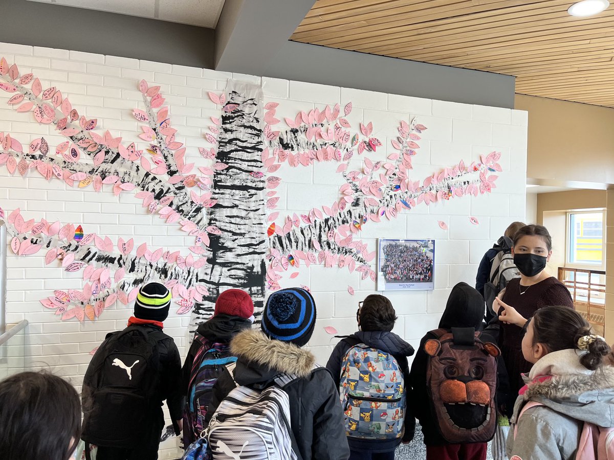WestStPaulScho1's tweet photo. Today is #DayofPink and even though we are at home on a rare snow day closure, our students were still prepared. 
Our lobby shows our #DayofPink tree where each student made a leaf showing our support. 
We stand in solidarity with our 2SLGBTQIA+ community today and everyday. https://t.co/ptE0VJ2WYV