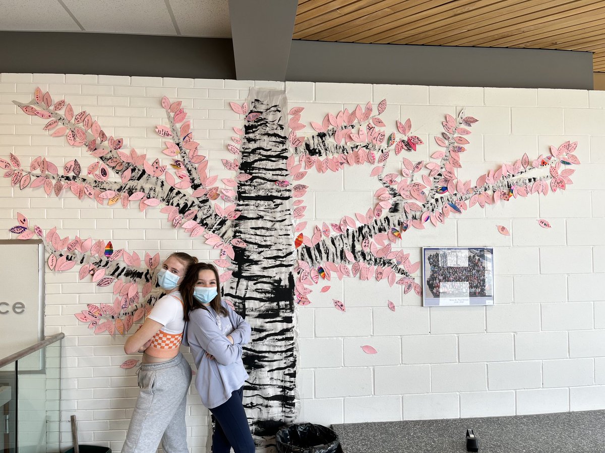 WestStPaulScho1's tweet photo. Today is #DayofPink and even though we are at home on a rare snow day closure, our students were still prepared. 
Our lobby shows our #DayofPink tree where each student made a leaf showing our support. 
We stand in solidarity with our 2SLGBTQIA+ community today and everyday. https://t.co/ptE0VJ2WYV