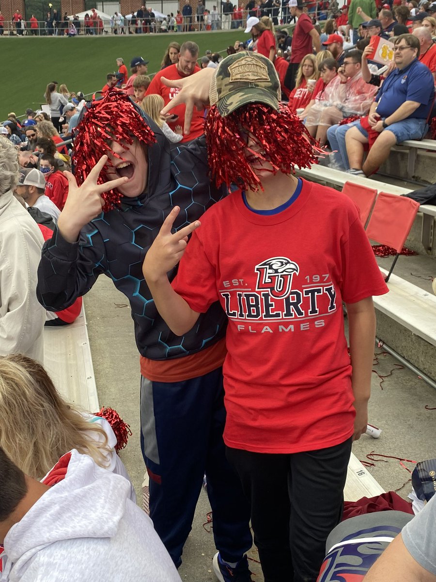 Maus1983's tweet photo. Flash back to last year when we went to an @LibertyFootball game ( hubby’s Alma mater & he played spring ball for them…back in the day) and they announced our name & put it on the big screen!🥳#LIbertyflames #notyourtypicalfootballmom #Leatch #football #CollegeFootball https://t.co/NavPlGq4lI