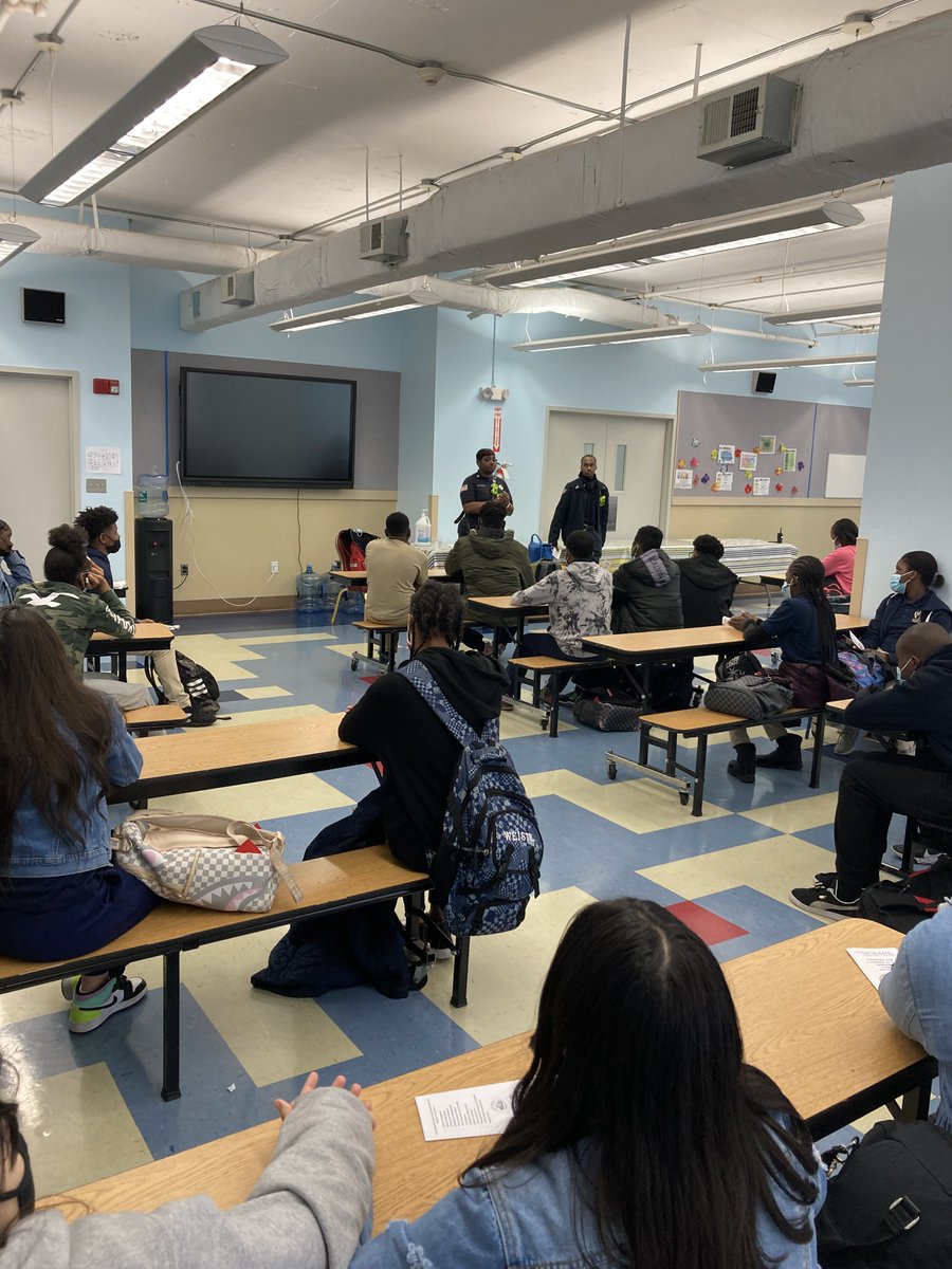 Two firefighters from the Newark Fire Division explained the process and benefits of being a firefighter during a Career Day at the University Heights Charter School's Junior High School on April 13. The eighth graders gave their full attention during this informative session.