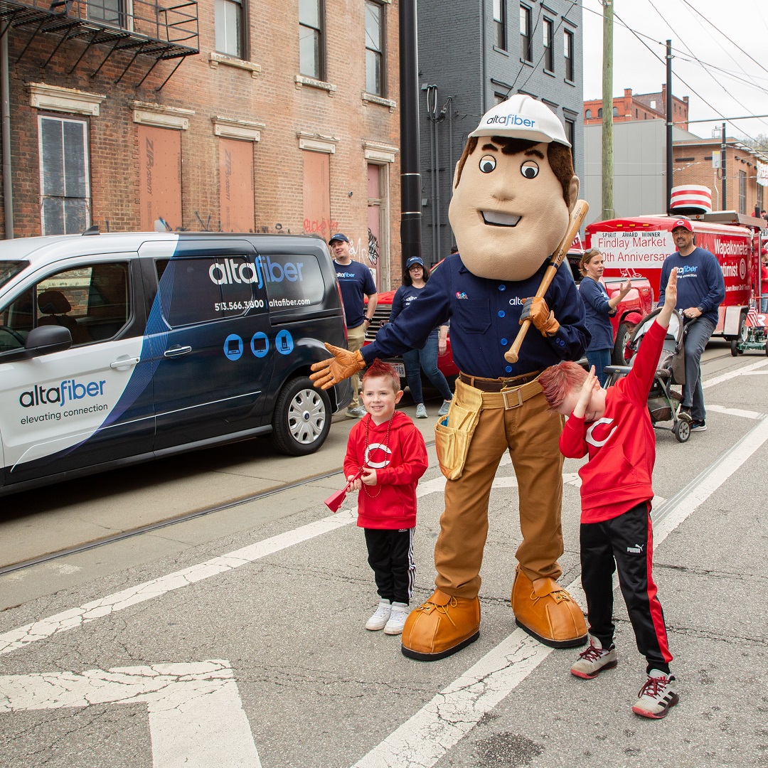 altafiber's tweet photo. Downtown Cincinnati was the place to be yesterday! The @FindlayMarket #OpeningDayParade returned and altafiber employees, families, and mascot had a blast. #ItsInOurFiber https://t.co/YeygzKl3Y4